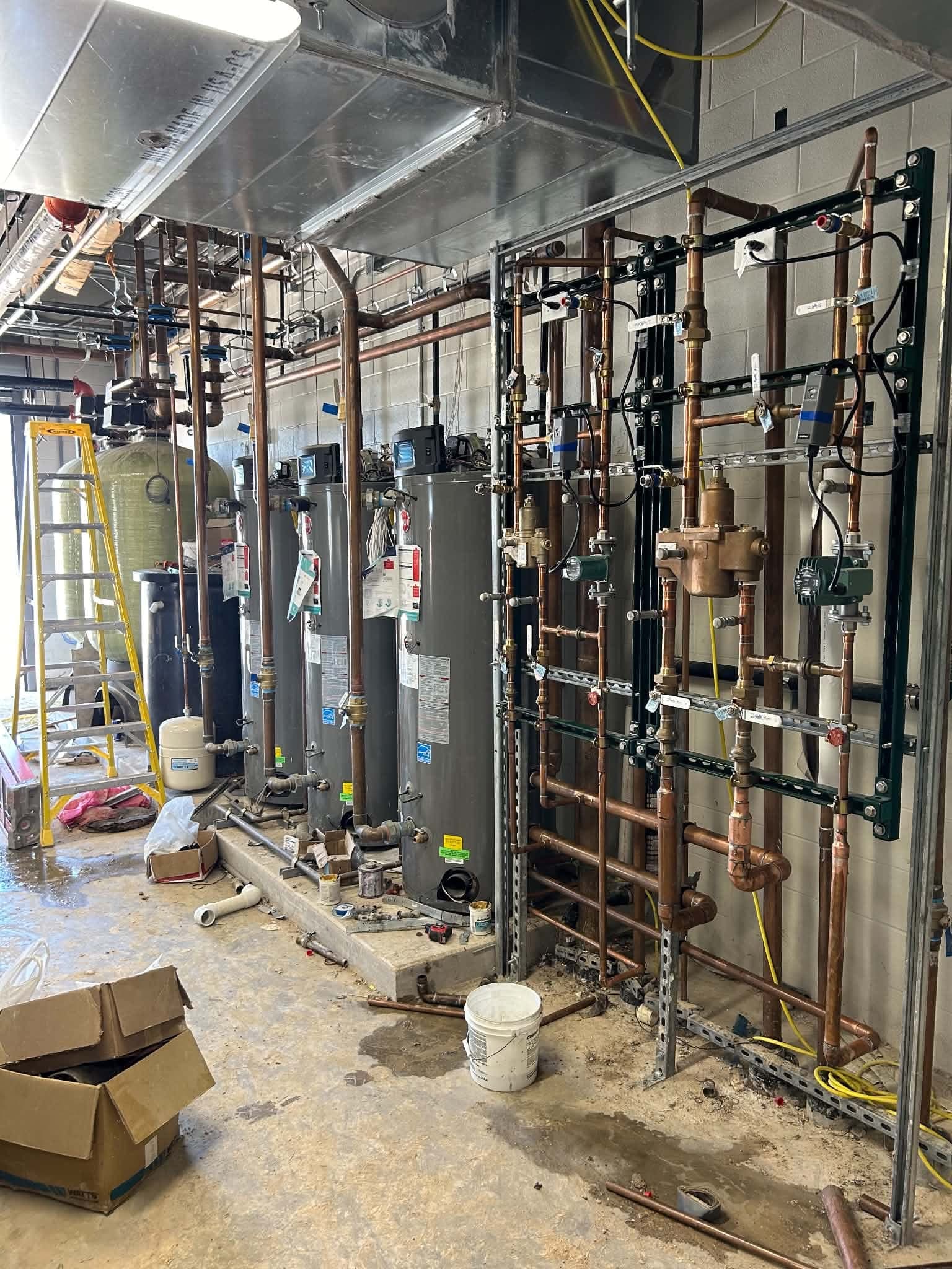 Commercial plumbing systems, mechanical piping, and building infrastructure